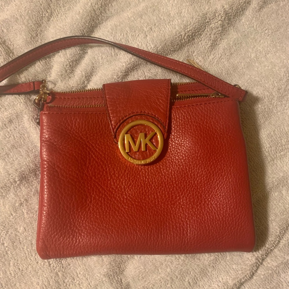 Authentic Michael Kors crossbody.Offers considered